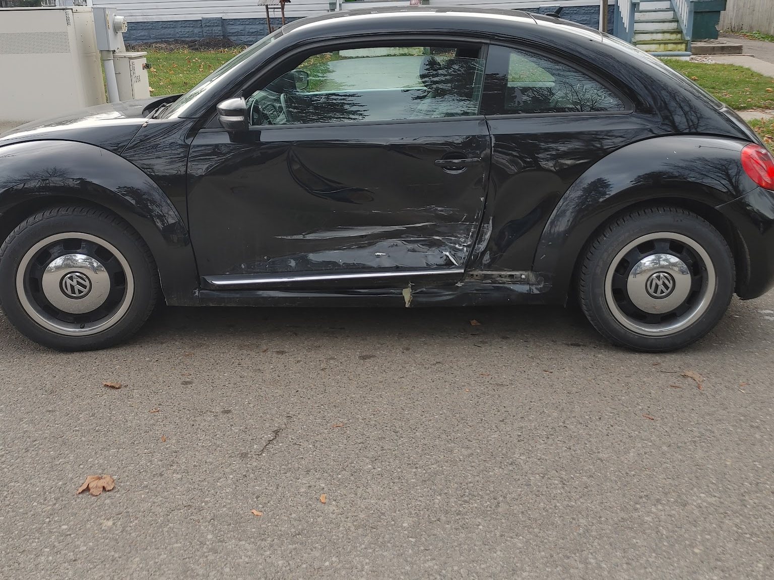 Side damage on a VW Beetle