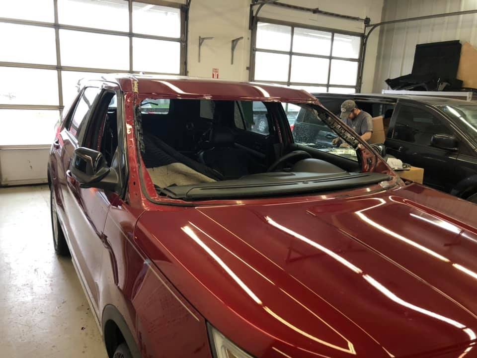 Red vehicle in the shop